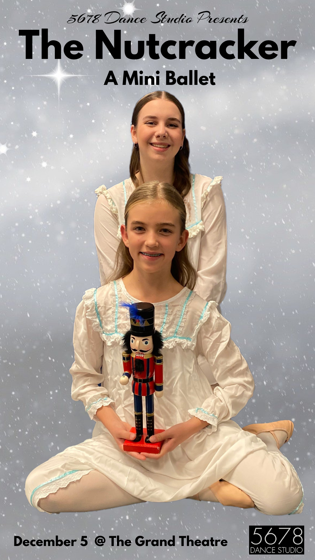 Dancers in cream coloured nightgowns with a nutcracker