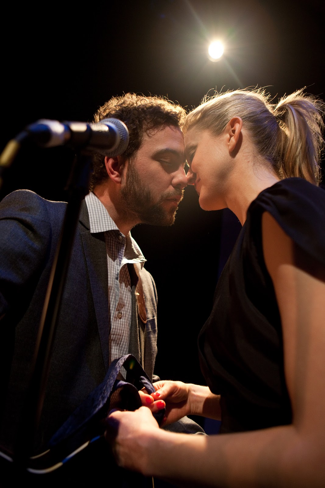 male and female actors looking lovely at each other