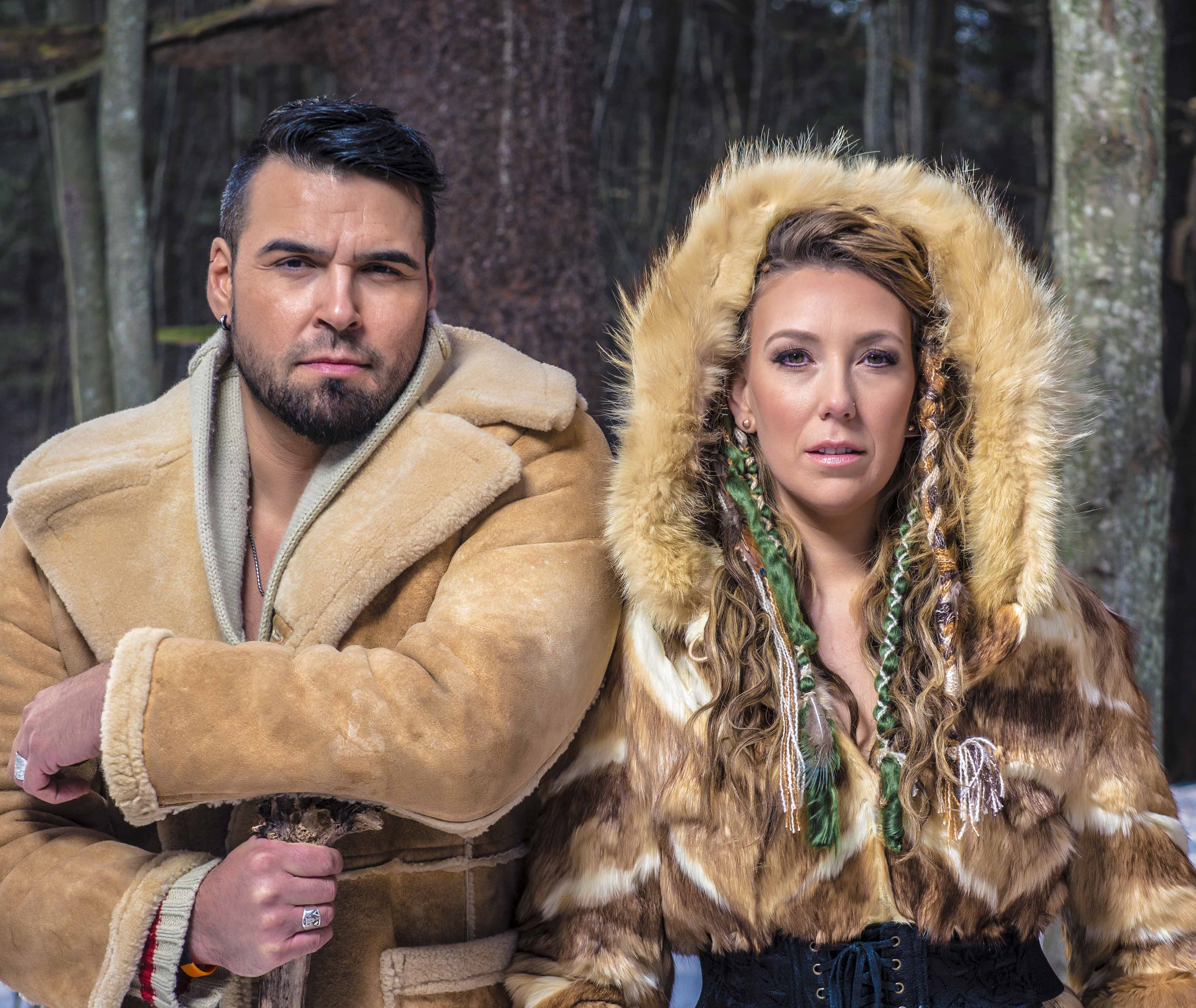 Husband and Wife in traditional indigenous dress for their respective heritage