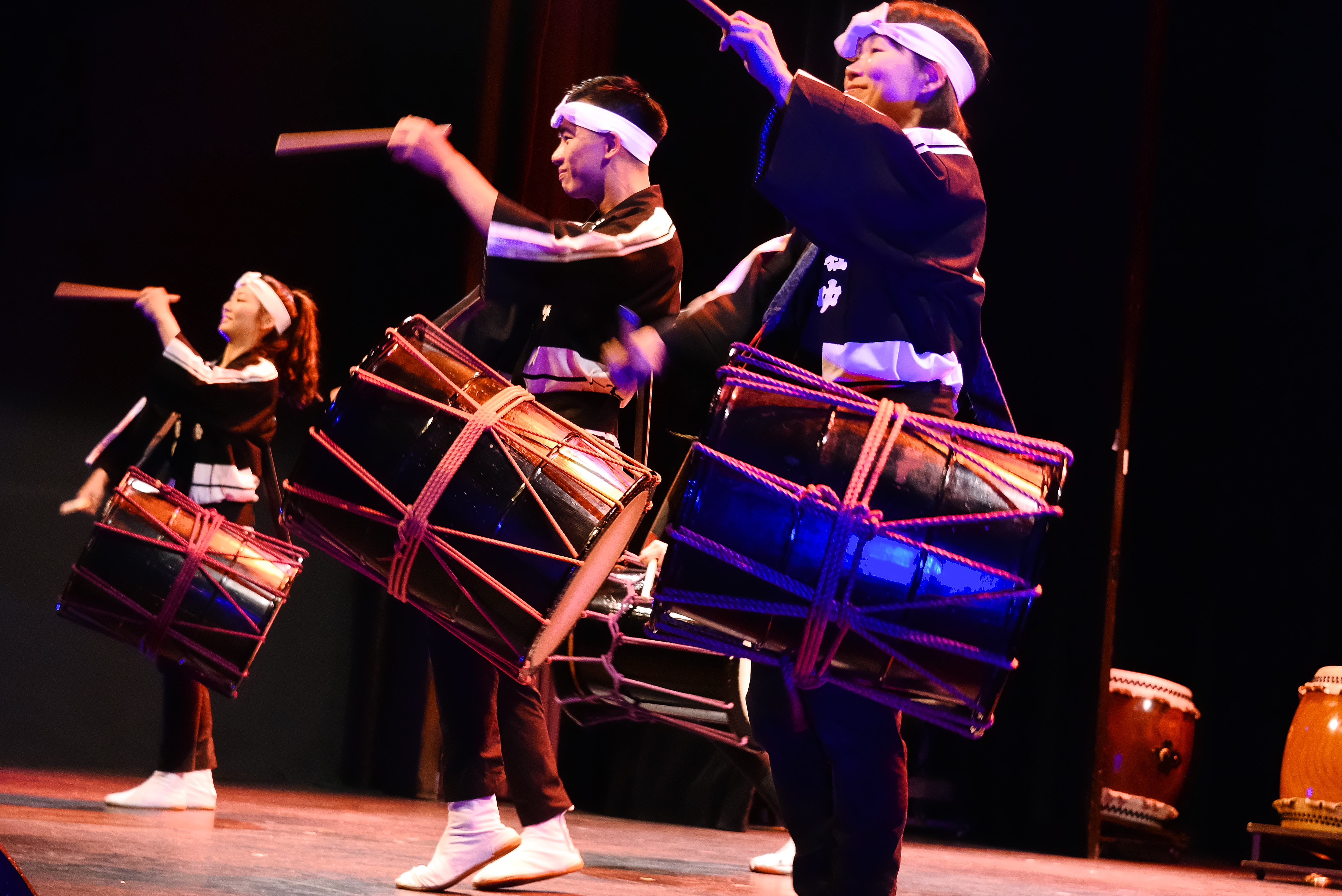 Drummers performing on stage