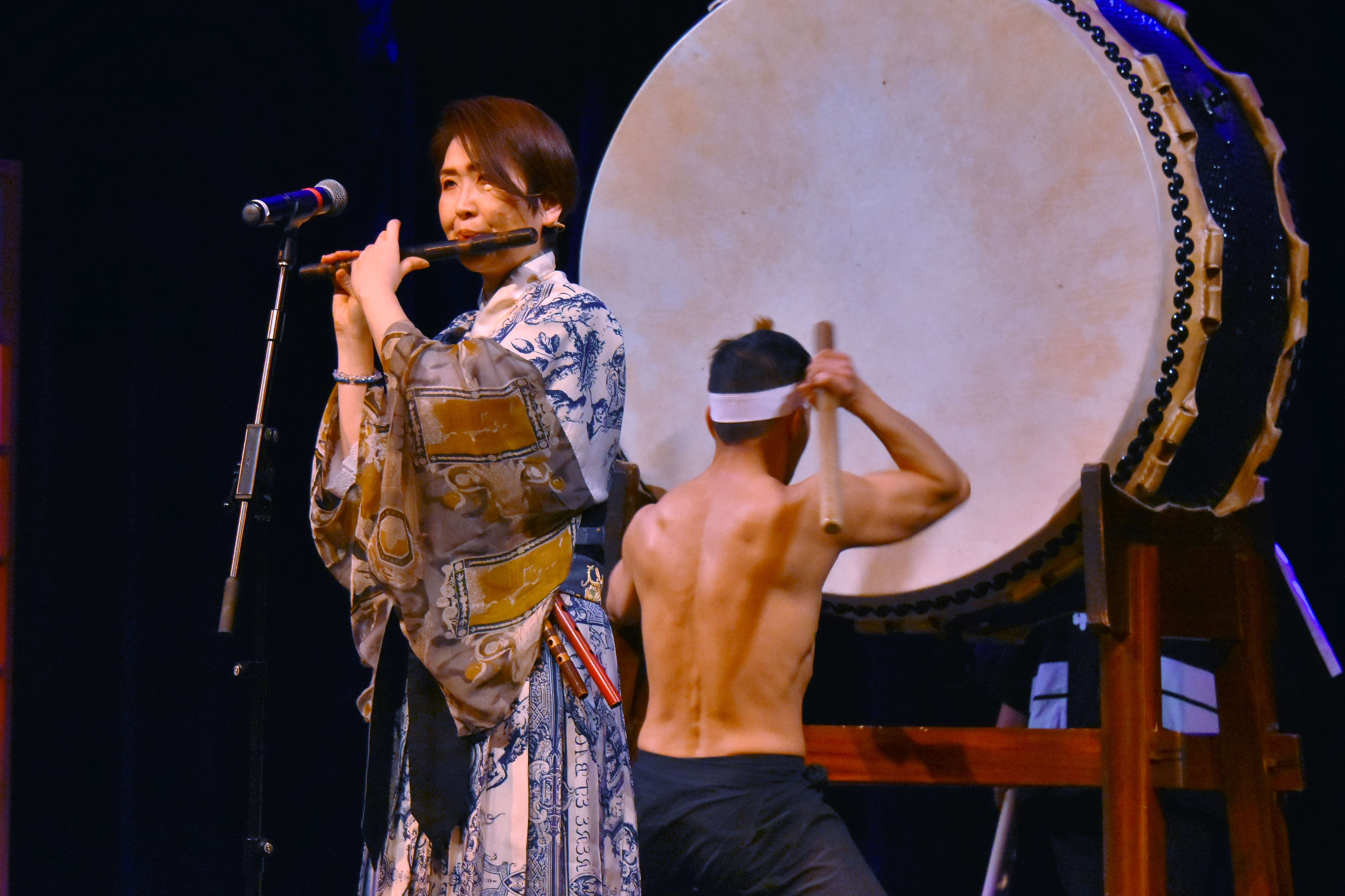 Drummers performing on stage