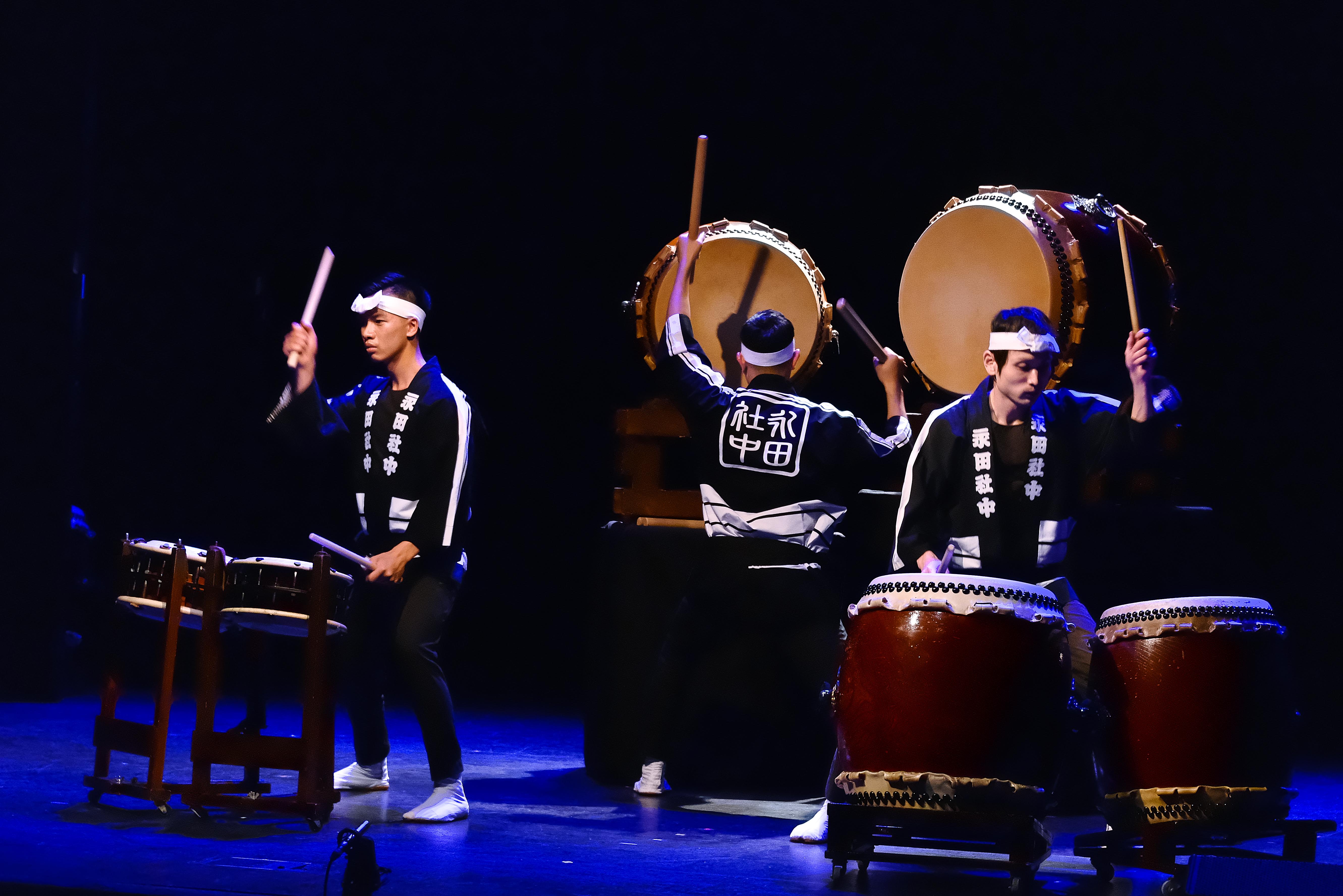 Drummers performing on stage