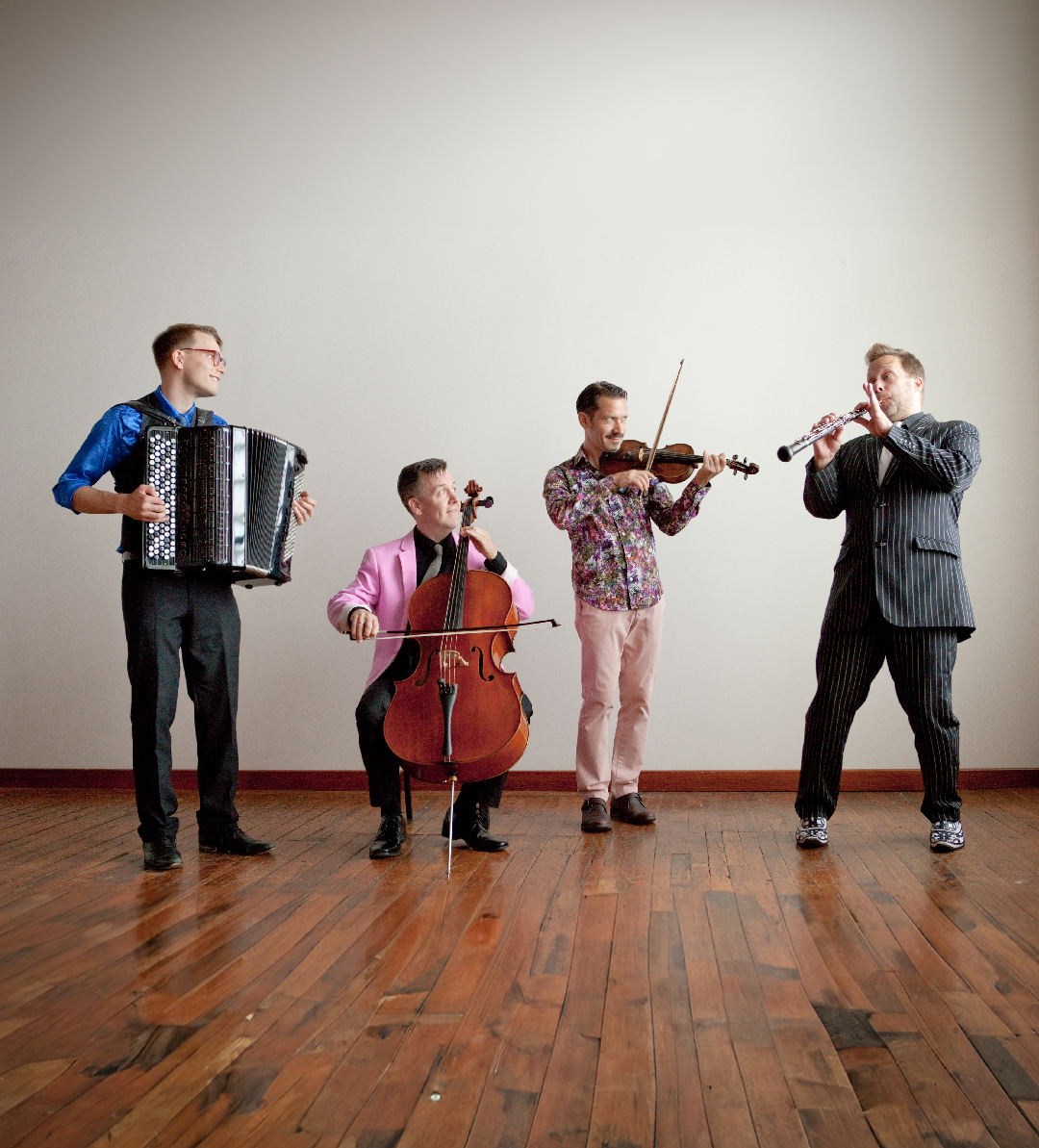 a row of performers with musical instruments