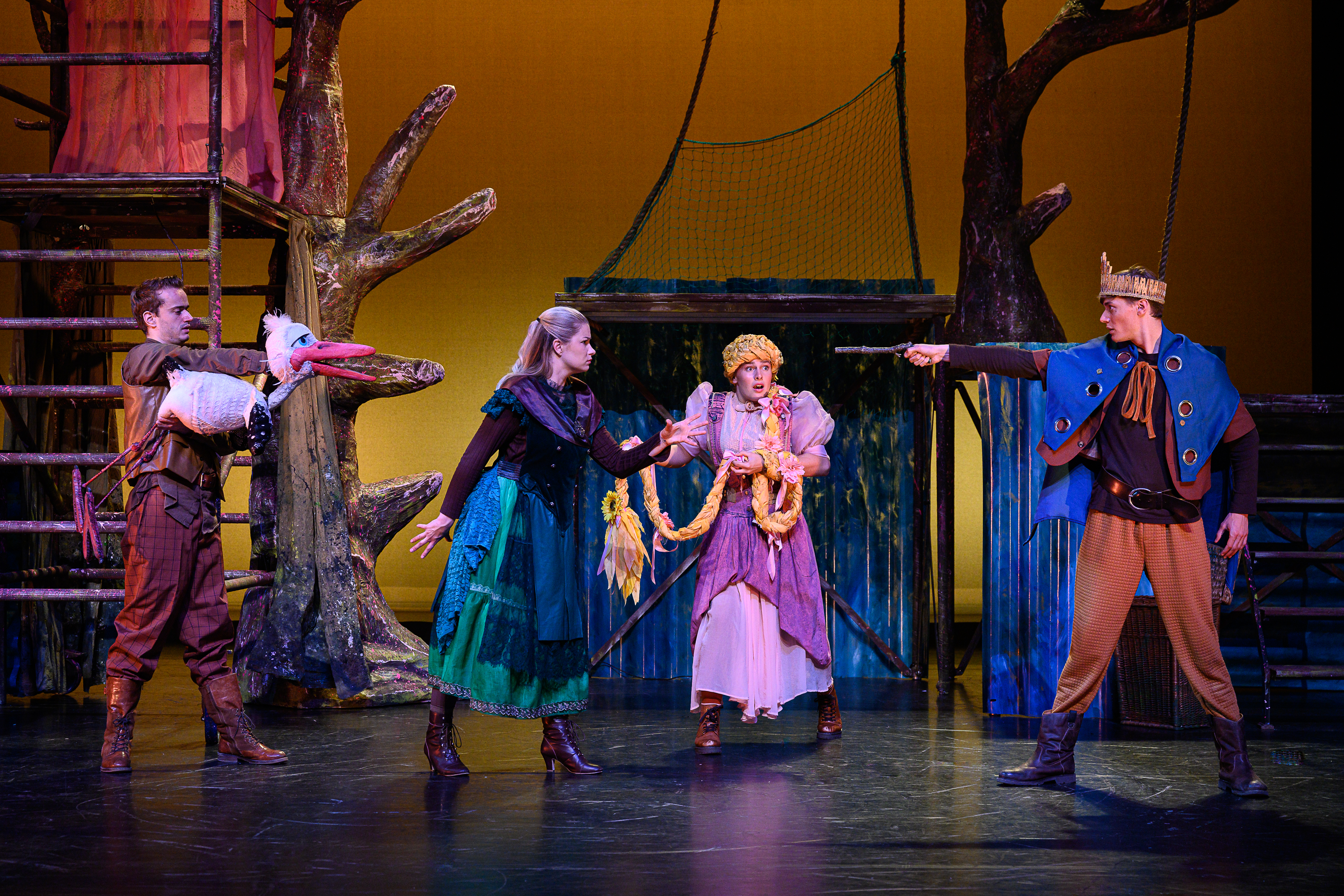 Actors on a stage performing the musical Rapunzel