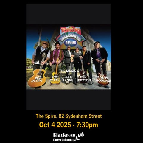 The performers in front of Caesars Palace with their band name on the marquee