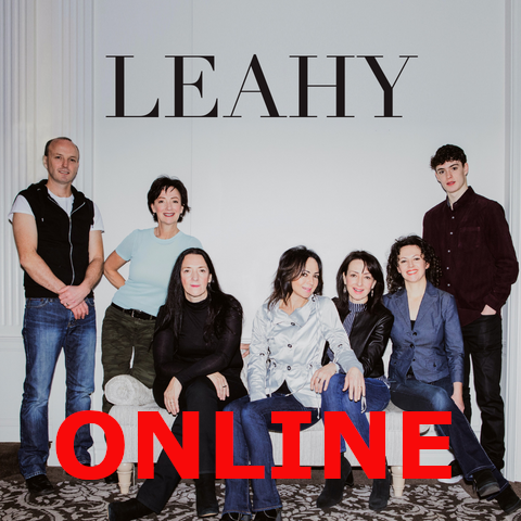 Leahy family in blue jeans in front of a white wall, ONLINE in red at the bottom