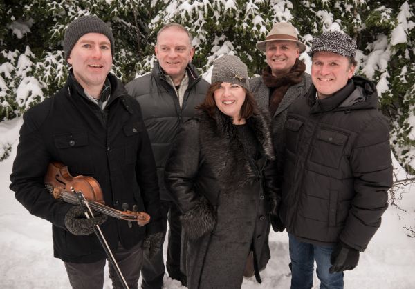 The Barra MacNeils with a fiddle in the snow