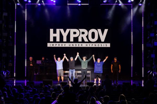 Volunteers from the audience participating in Hyprov