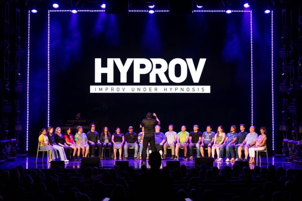 Volunteers from the audience participating in Hyprov