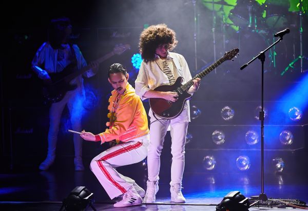 Queen performers on stage